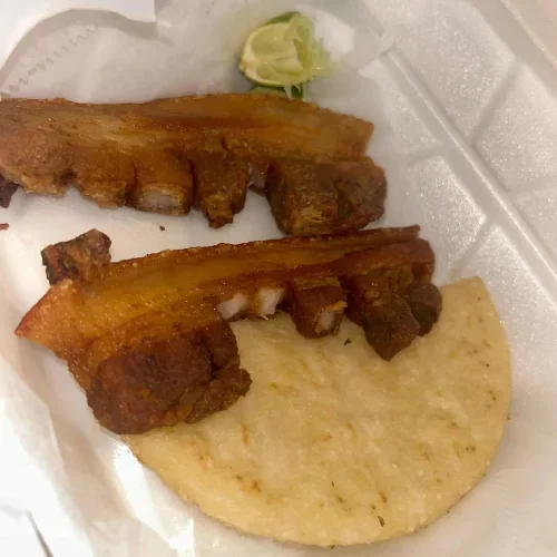 Chicharron Portion - Crispy fried pork belly, a staple of Colombian cuisine.