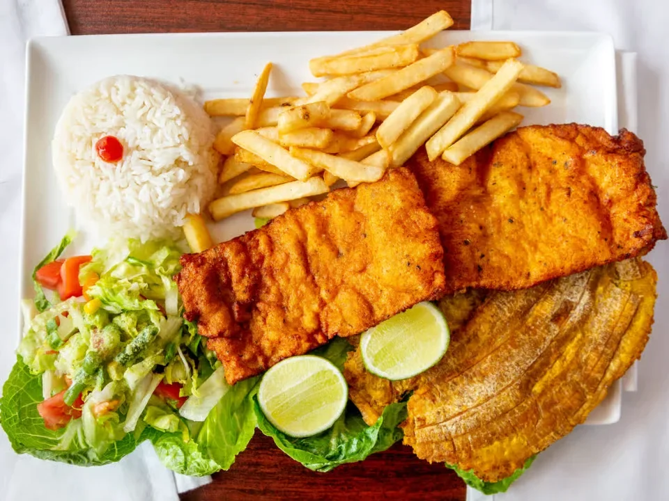 Breaded Fried Pork Loin - Crispy breaded pork loin served with traditional sides.
