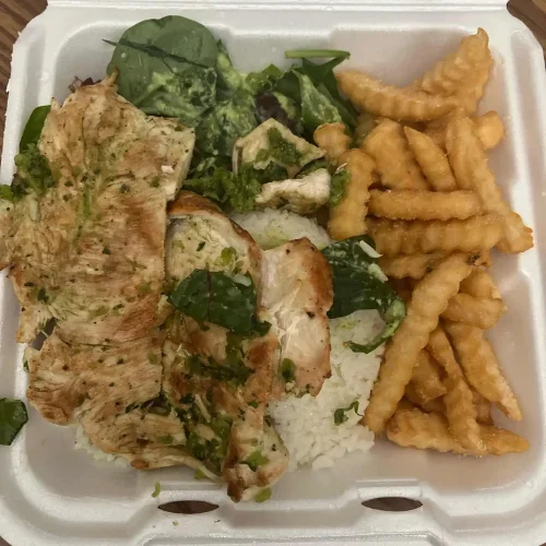 Grilled Chicken - Juicy grilled chicken breast seasoned with Colombian herbs.