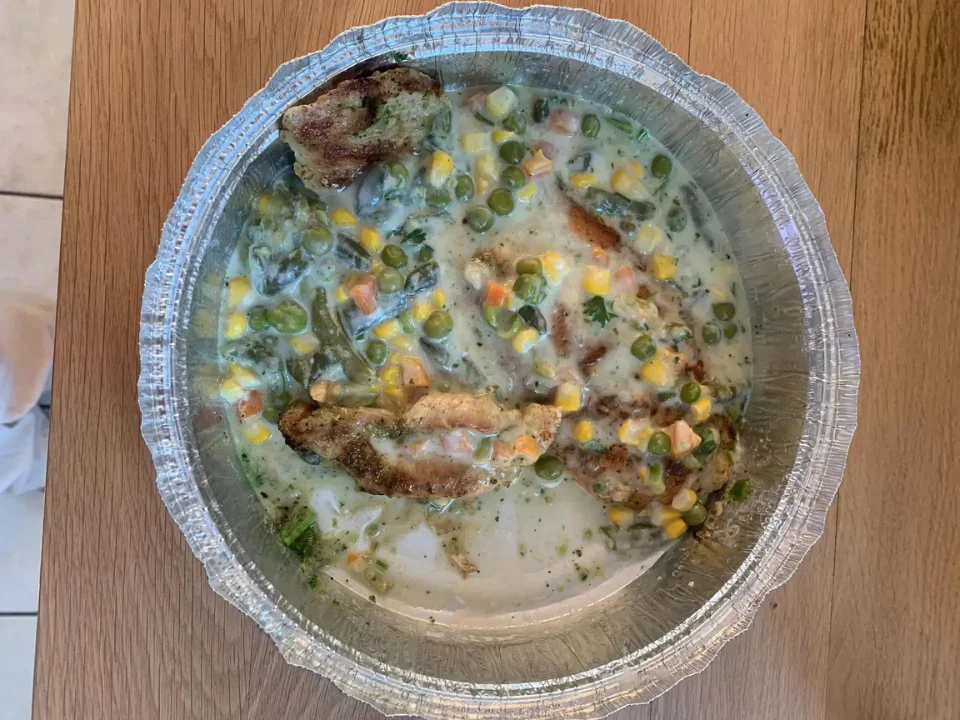 Chicken in Mixed Vegetable Sauce - Tender chicken simmered in a rich, savory mixed vegetable sauce.